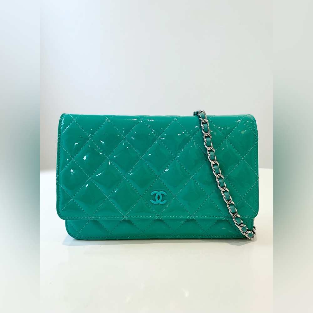 CHANEL Wallet On Chain Crossbody bag in quilted green patent leather